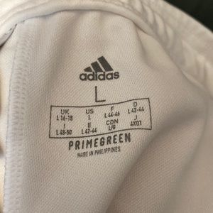 Zipper pockets, zipper from ankle to top of calf, tie on inside of waistband